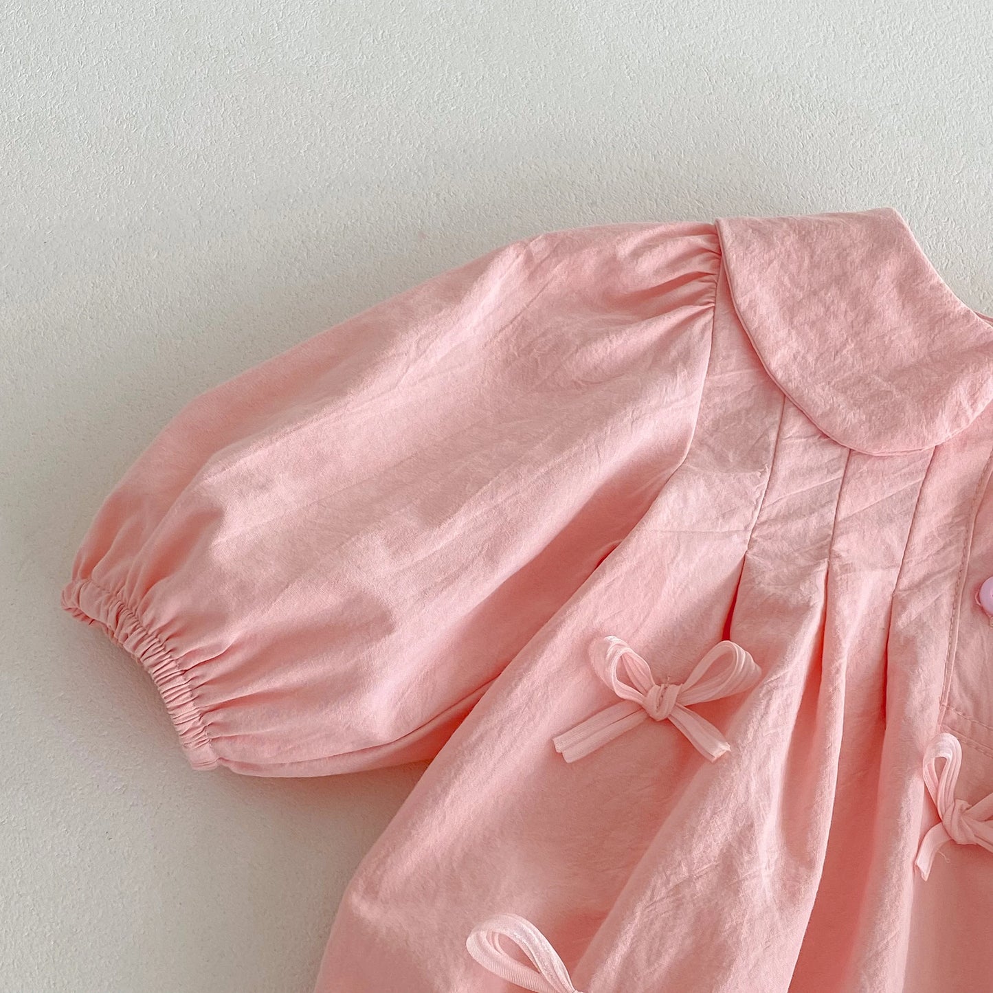Lumi Romper – Delicate Bow Detail